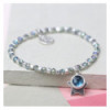 Silver cube bead and blue crystal bracelet with star